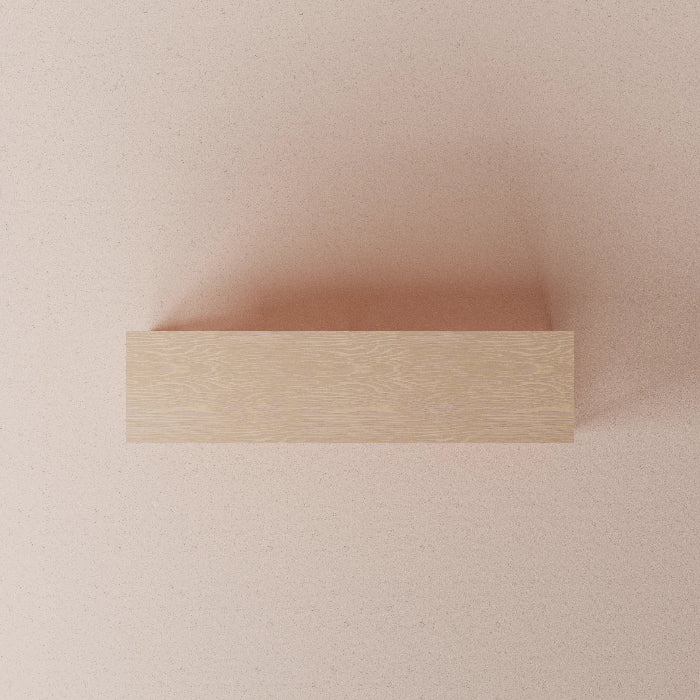 Wooden shelf on a beige wall