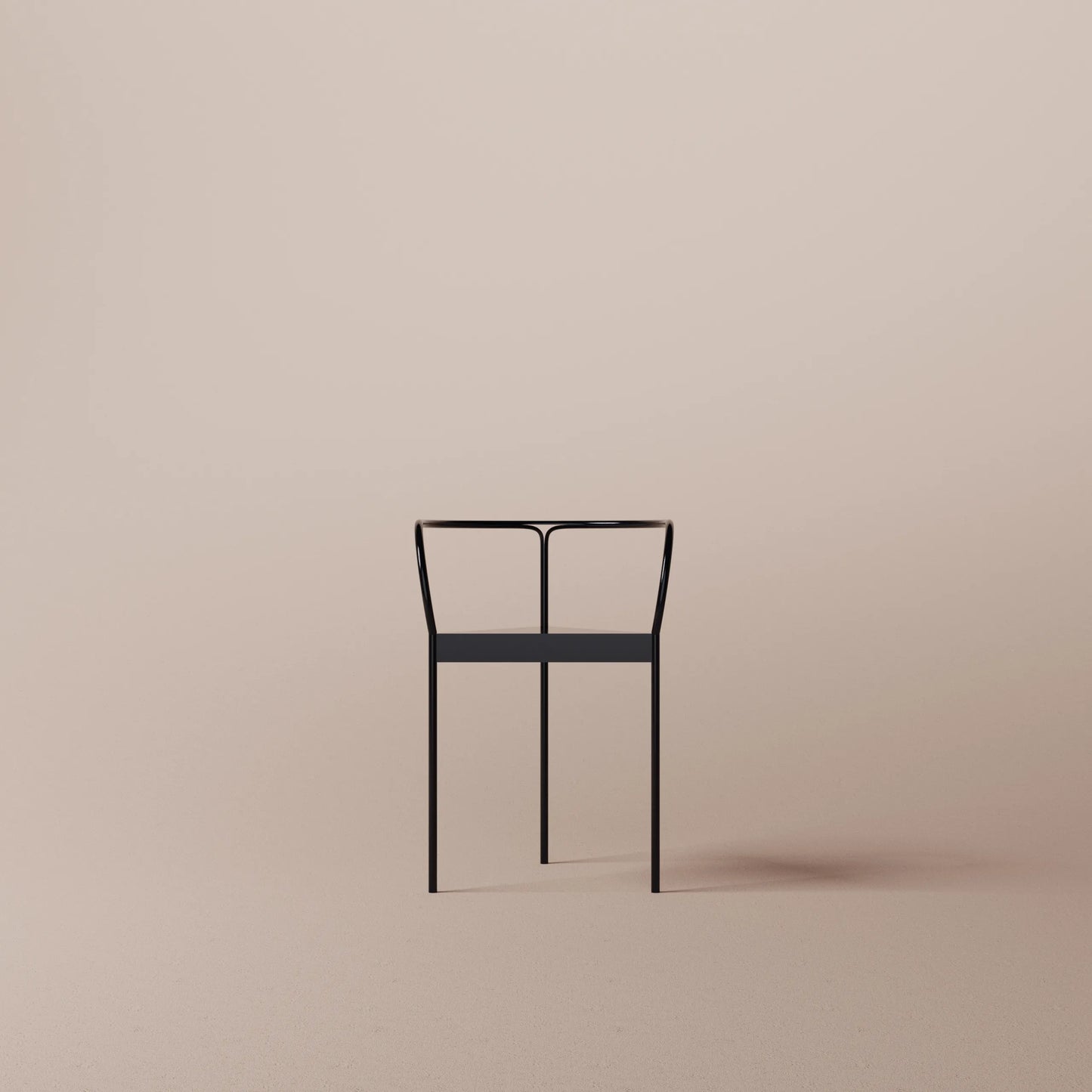 Black chair on a beige background