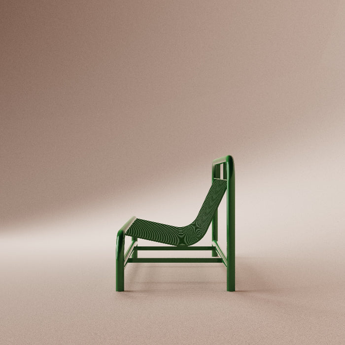 Green chair on a beige background