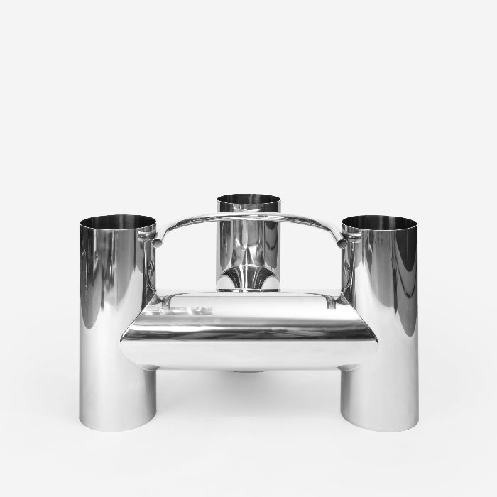 Modern silver chair with a minimalist design on a white background