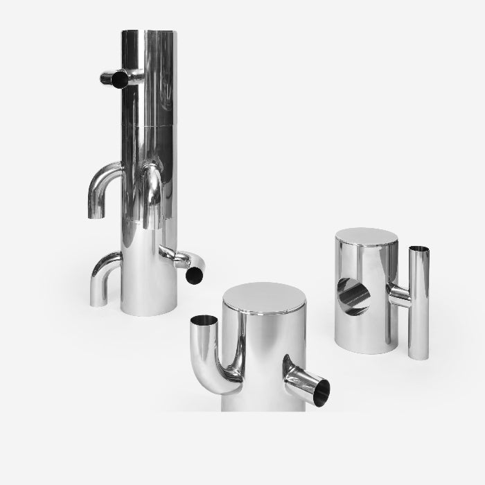 Set of chrome kitchen faucets on a white background