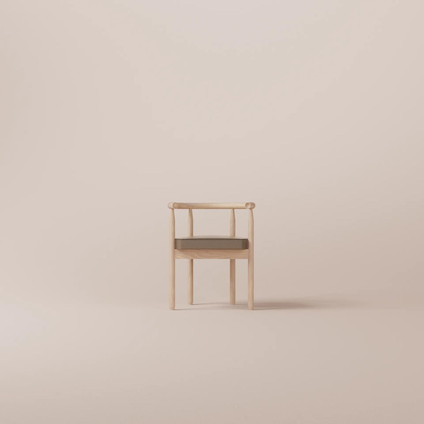 Minimalist chair with a cushion on a beige background