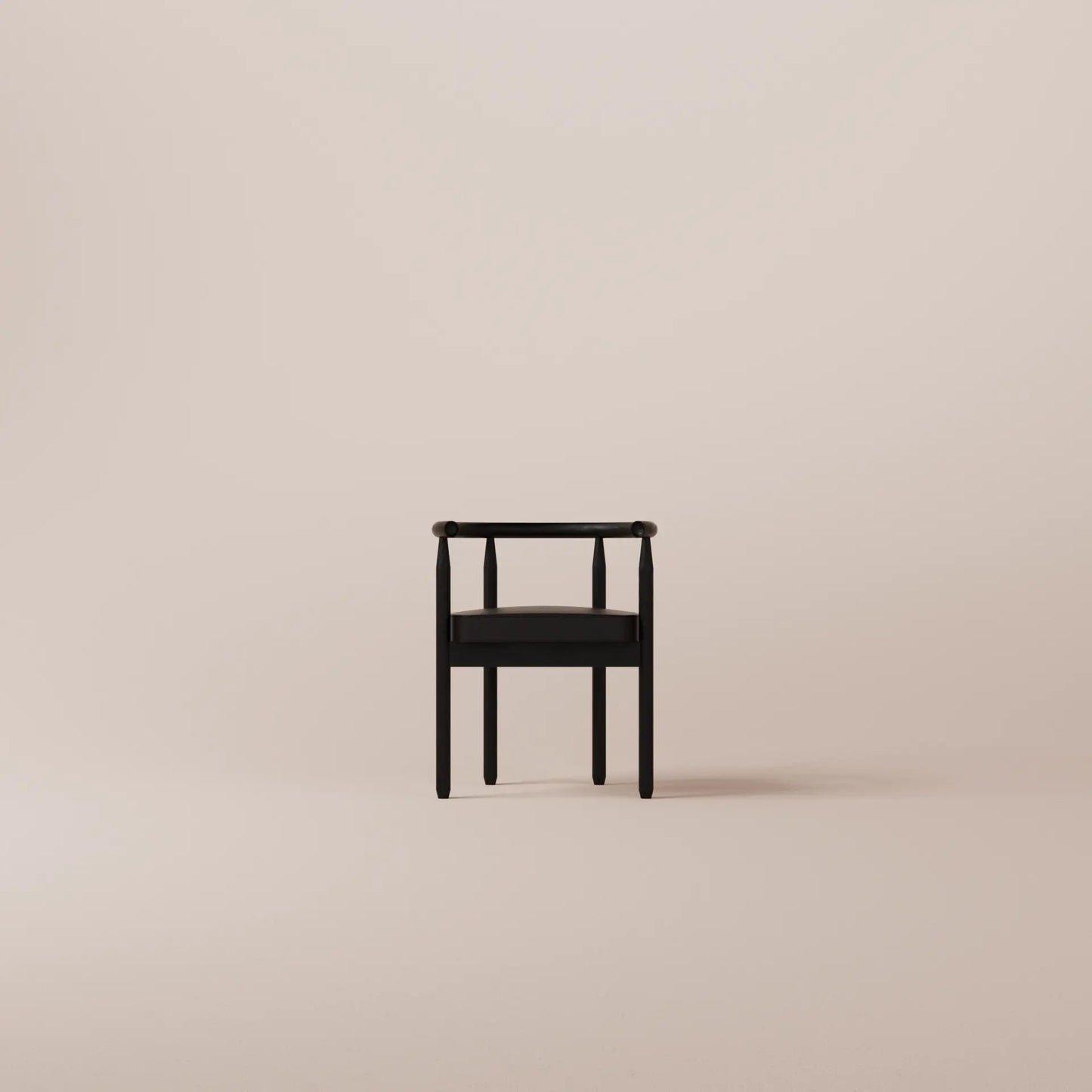 Black chair on a beige background