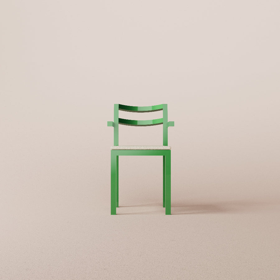 Green chair on a beige background