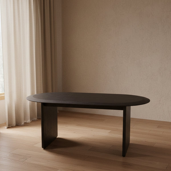 Round wooden table on a beige background