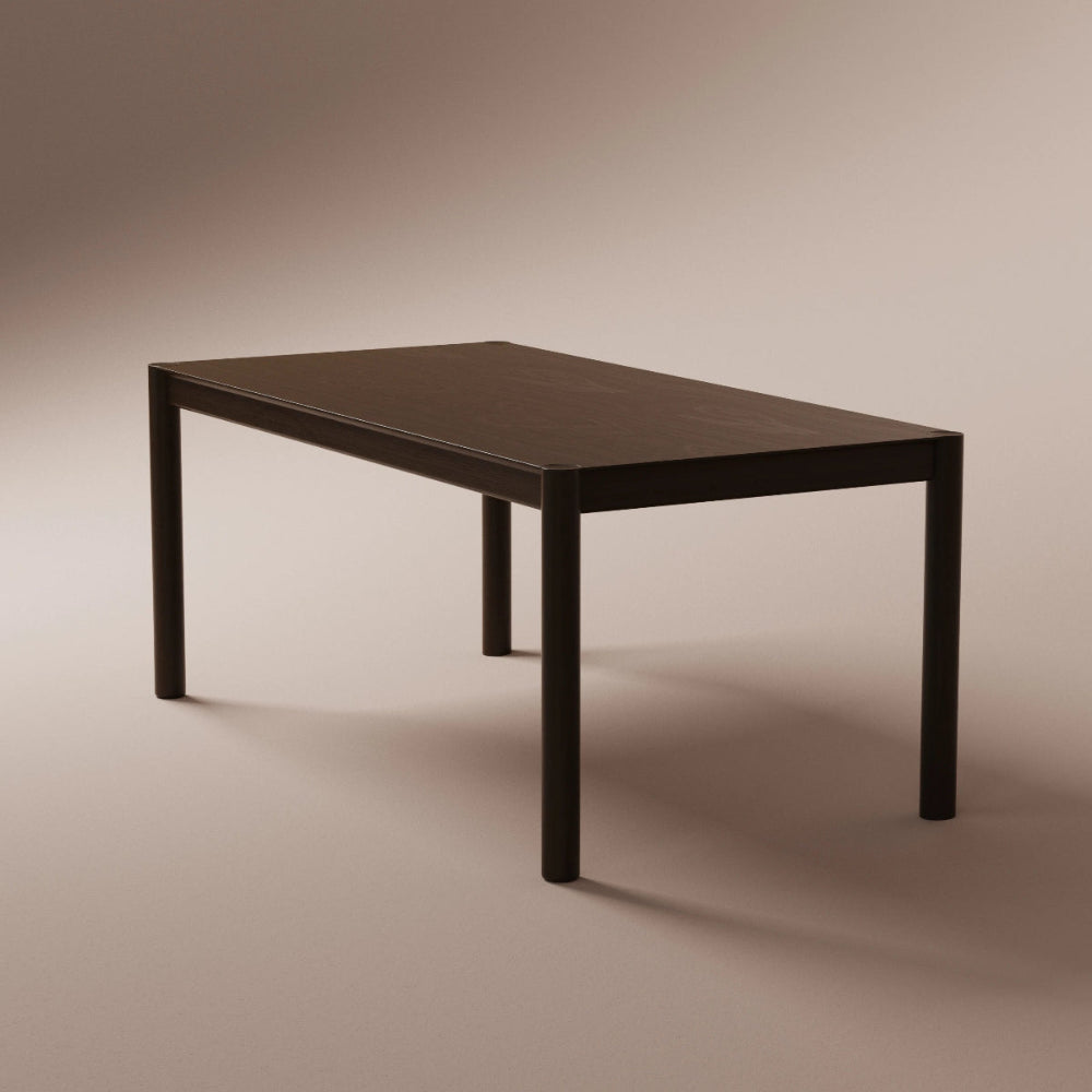 Solid walnut table on a beige background