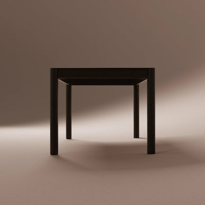 Solid charcoal ash table on a beige background